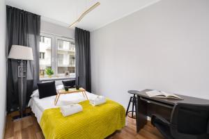 Posteľ alebo postele v izbe v ubytovaní Apartment Różana Poznań by Noclegi Renters