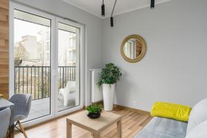 Posedenie v ubytovaní Apartment Różana Poznań by Noclegi Renters