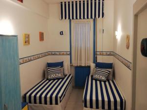 Postel nebo postele na pokoji v ubytování Italymare apartment