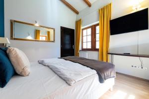 Templomvölgy Butik Hotel Mátrakeresztes房間的床