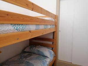Postel nebo postele na pokoji v ubytování Edificio Arenal