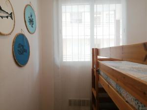 Postel nebo postele na pokoji v ubytování Edificio Arenal