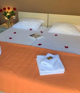 Postel nebo postele na pokoji v ubytování Hotel Belveder