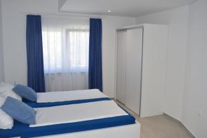 Postel nebo postele na pokoji v ubytování Villa Dalija
