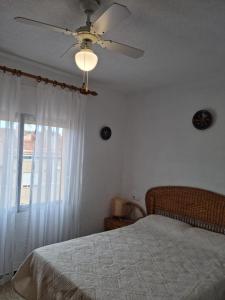 Posteľ alebo postele v izbe v ubytovaní APARTAMENTO LEO