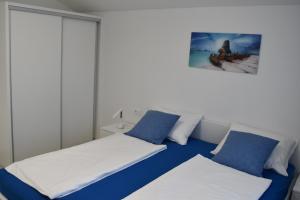 Postel nebo postele na pokoji v ubytování Villa Dalija