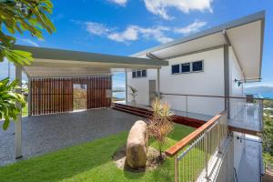 an image of a house with a balcony at SEA-Renity on Castle Hill in Townsville