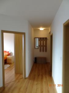 A bed or beds in a room at Ubytování Liptov