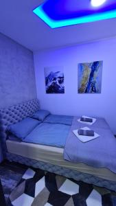 Ліжко або ліжка в номері Apartmani PART