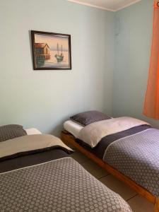 Postel nebo postele na pokoji v ubytování Les Thuyas