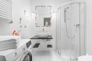 Kúpeľňa v ubytovaní Jantar Apartamenty- Zielone Tarasy