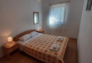 Postel nebo postele na pokoji v ubytování Apartment Classic + 14 fotografií