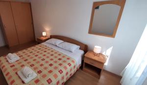 Postel nebo postele na pokoji v ubytování Apartment Classic