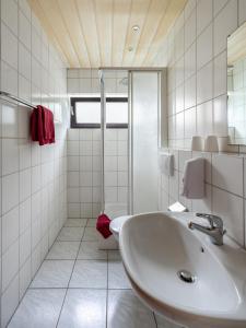 Kylpyhuone majoituspaikassa Hotel Häfner
