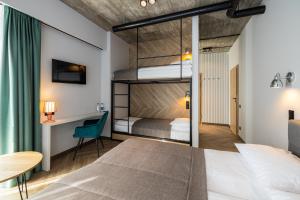 Postel nebo postele na pokoji v ubytování Da Home Urban Hotel self check-in