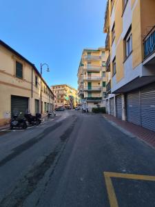 an empty street with motorcycles parked on the side of a building at Casa Della Paola by PortofinoVacanze in Santa Margherita Ligure