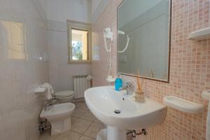 Koupelna v ubytování Agriturismo LA FATA