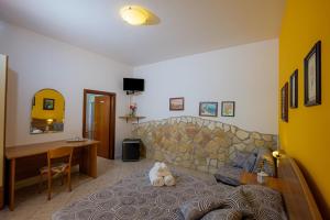 TV a/nebo společenská místnost v ubytování Agriturismo LA FATA
