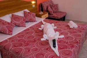 Postel nebo postele na pokoji v ubytování Agriturismo LA FATA