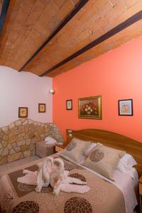 Postel nebo postele na pokoji v ubytování Agriturismo LA FATA