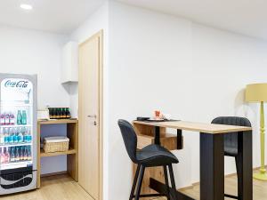 Kuchyň nebo kuchyňský kout v ubytování Gasthof Hametner mit Innviertlerhof mit direktem Zugang zur Therme Mediterrana durch unseren Garten!