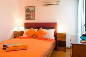 Posteľ alebo postele v izbe v ubytovaní Lovely & Cozy Apartment with Magnificent Sea View, near the center