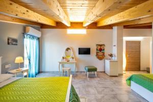 Postel nebo postele na pokoji v ubytování B&B La Canfora