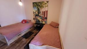 Ένα ή περισσότερα κρεβάτια σε δωμάτιο στο Bungalow Küstenherz-Timmendorf