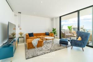 A seating area at HigueronRentals Skotte