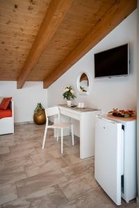 TV a/nebo společenská místnost v ubytování B&B La Canfora