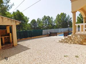 Fotografie z fotogalerie ubytování Chalet con piscina (A) v destinaci Les tres Cales