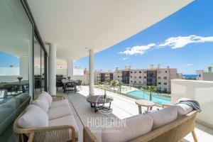 a view from the living room of a luxury apartment at HigueronRentals The Palm in Málaga
