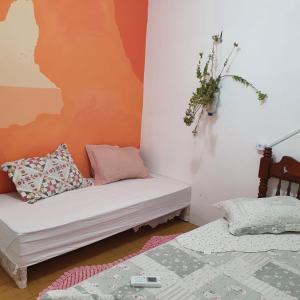 En eller flere senge i et værelse på Hostel e Cachaçaria da Cris