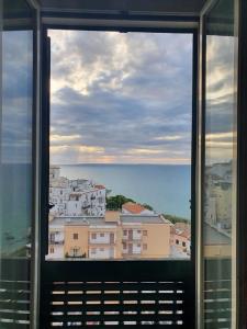 a view of a city from a window at Appartamento D&G in Rodi Garganico