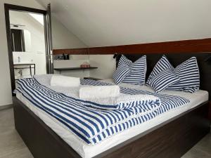 Postel nebo postele na pokoji v ubytování Apartmán D5 Nová Pec