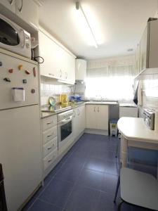 Kuchyňa alebo kuchynka v ubytovaní Apartment- Charly