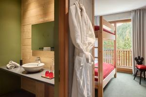 Voodi või voodid majutusasutuse Hotel Ortles B&B toas