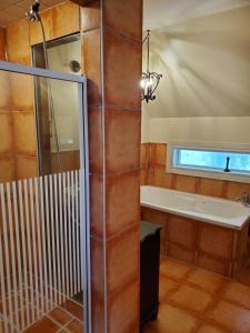 Koupelna v ubytování Rothesay Motel + 37 fotografií