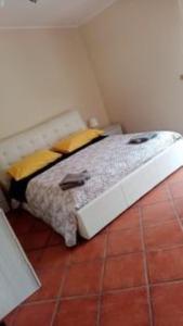Postel nebo postele na pokoji v ubytování B&B Le terrazze di Pompea