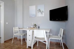 Telewizja i/lub zestaw kina domowego w obiekcie Apartamento La Estrella ii