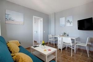 Telewizja i/lub zestaw kina domowego w obiekcie Apartamento La Estrella ii