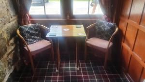 A seating area at Inchbae Lodge