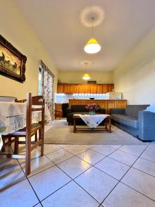 Posezení v ubytování Village Apartment