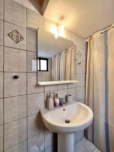 Koupelna v ubytování Village Apartment + 9 fotografií