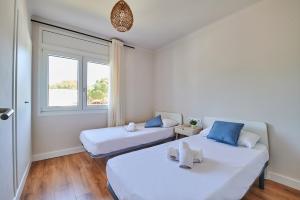 Posteľ alebo postele v izbe v ubytovaní Costa Brava E-4 + 21 fotografií