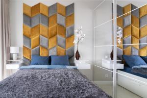 Posteľ alebo postele v izbe v ubytovaní Apartament 1612 Modern Tower Gdynia