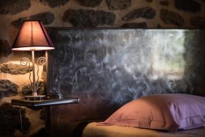 Rúm í herbergi á SUCHASSON EXCEPTIONNEL GITE DE 400 M2
