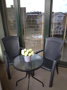 Posedenie v ubytovaní Apartament Nad Różami