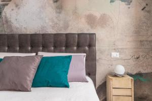 Кровать или кровати в номере Casa Ester in San Salvario by Wonderful Italy