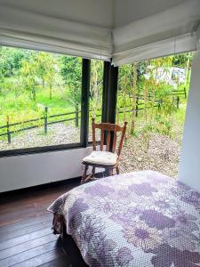 Postel nebo postele na pokoji v ubytování Condominio Hacienda Shangrila